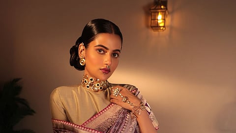 Actor Ushasi Ray as a modern bride in this purple Benarasi