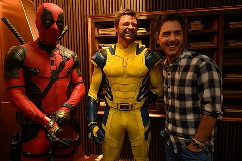 Ryan Reynolds as Deadpool, Hugh Jackman as Wolverine and director Shawn Levy in bts glimpse from the film (L-R)