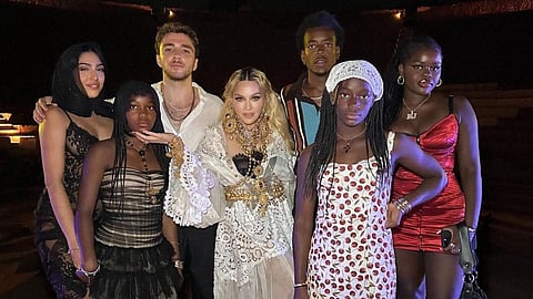 Madonna(C) with her children
