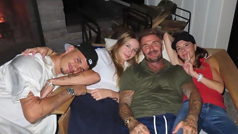 David Beckham and Victoria Beckham with their kids