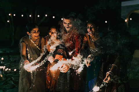 The festive spirit is palpable, with homes adorned in vibrant decorations and communities coming together for feasts and festivities