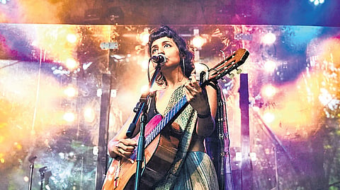 Aditi Veena aka Ditty performing at a concert