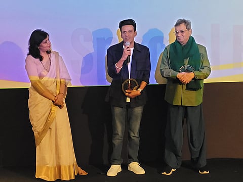 (In frame) Manoj Bajpayee (C)  and Subhash Ghai at IFFI