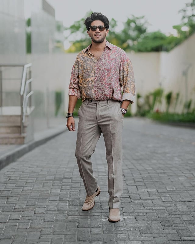 dulquer salmaan formal dress Thanks for the endless love Dubai  #Kaantha #kaanthafromnov14 Outfit:  @tomford Styling: @Harmann_kaur_2.0 Assisted by: @paswettt Hair:  @rahhuldevlankar_hair Make up: @av_ratheeshcinema Photo: @sbk_shuhaib