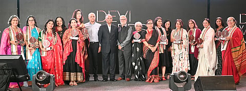 (From left) Devi Awardees, Vimor co-founder Pavithra Muddaya; Professor and dean (research), National Centre for Biological Science, Dr Vatsala Thirumalai; classical dancer Nirupama Rajendra; TNIE CEO Laxmi Menon; Mitti Café founder and CEO Alina Alam; two-time Olympian Anju Bobby George; TNIE chairman Manoj Kumar Sonthalia; former Infosys CEO SD Shibulal; TNIE editorial director Prabhu Chawla; NIMHANS director Dr Pratima Murthy; TNIE editor Santwana Bhattacharya; Science Gallery Bengaluru founding director Jahnavi Phalkey; director of Events Xpress, Neha Sonthalia Periwal; founder and managing trustee of Neev Schools, Kavitha Gupta Sabharwal; restaurateur Sonali Sattar; author Samhita Arni; and founder and managing trustee of Sanket Trust, Arundhati Nag, pose with their awards at the 29th edition of the Devi Awards in Bengaluru on November 30. Meanwhile, Kalyani collected the award on behalf of Portea Medical co-founder and chairperson Meena Ganesh.