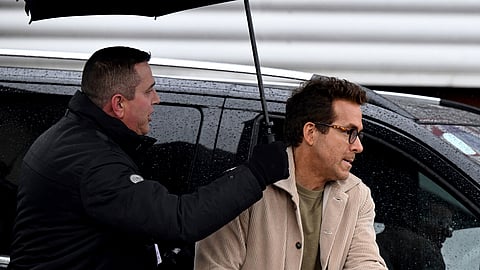 Wrexham co-owner Ryan Reynolds arrives at SToK Cae Ras, ahead of the English Football League One soccer match between Wrexham and Cambridge United