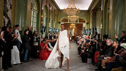 A model wears a creation as part of the Imane Ayissi Haute Couture Spring Summer 2025 collection, that was presented in Paris