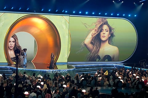 Shakira accepts the award for best Latin pop album for "Las Mujeres Ya No Lloran" during the 67th annual Grammy Awards on Sunday, Feb. 2, 2025, in Los Angeles. Jennifer Lopez looks on from left