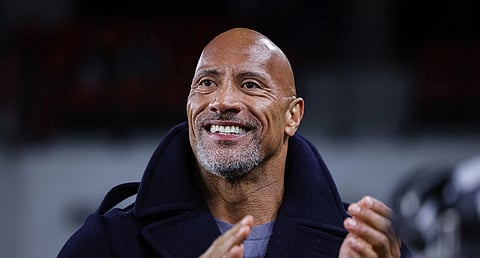 How close is The Rock to billionaire status?