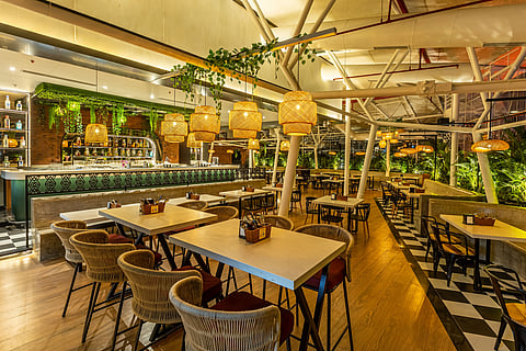 This chic rooftop spot serves global cuisine with a lively bar and cosy ambiance
