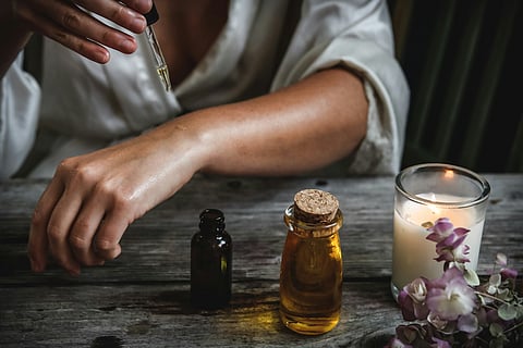 With the right oil and technique, you can glisten all summer long