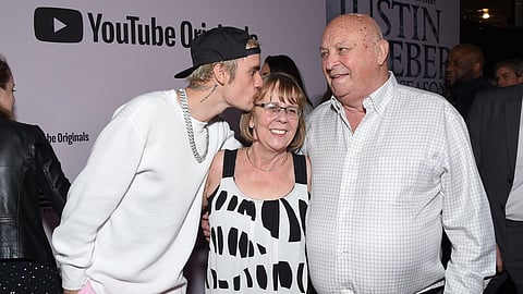 Justin Bieber (L); Bruce Dale (R)