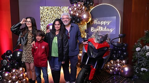 Ajith Kumar (R) with family 
