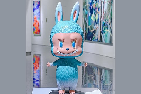 The mint blue life-sized Labubu doll that got auctioned in Beijing, China