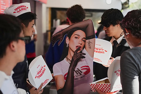 Fans and consumers take part in the opening of Dua Lipa's Taqueria, a pop-up restaurant for her fans in Mexico City