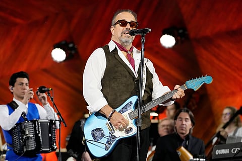 Raul Malo, center, and The Mavericks perform during the Boston Pops Fireworks Spectacular in Boston on July 4, 2024