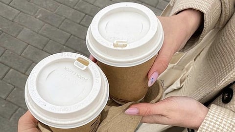 The holes on takeaway coffee cups are designed to release steam and balance airflow ensuring a smooth and spill free drinking experience