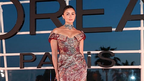 Alia Bhatt’s Cannes fashion journey reached its most striking moment yet with a burgundy couture look inspired by historical chintz textiles