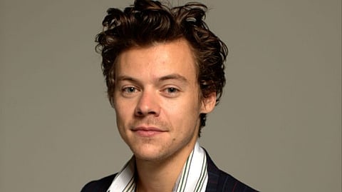 Harry Styles falls during performance in London heatwave before quickly recovering and continuing the show 
