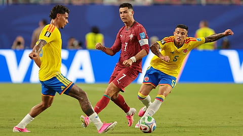 Portugal settle for a draw against Colombia to finish second in World Cup group  