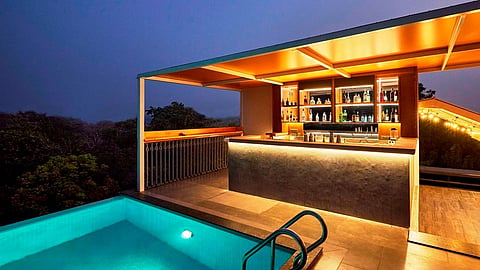 View of the terrace pool at The Passport Hotel, Assagaon