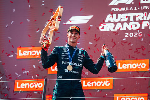 George Russell coolly lifted off just enough through a late yellow flag zone to secure pole position