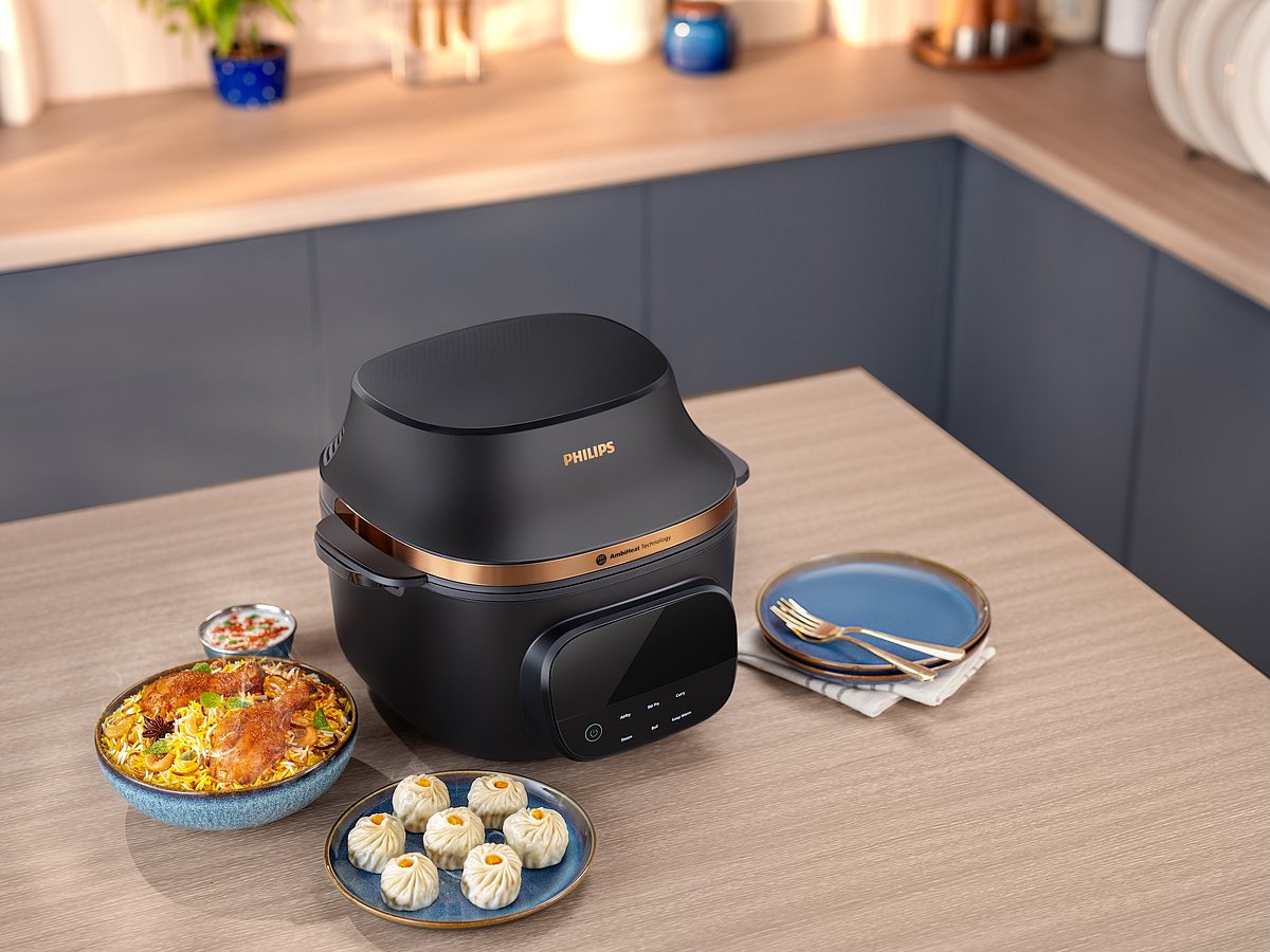 Want an all-rounder in your kitchen? This one is a cooking pot, air-fryer, idli plate, and a steaming basket