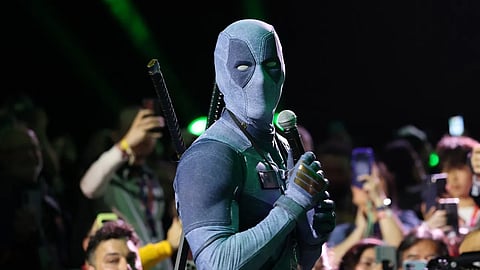 Ryan Reynolds surprises fans at San Diego Comic Con as Deadpool