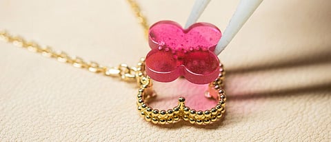 Van Cleef & Arpels is giving the iconic motif a more playful update with a new vibrant pink enamel