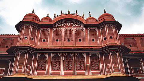From Shekhawati’s painted lanes to Panaji’s narrow streets, explore 7 pink places in India