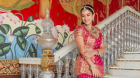 Radhika Merchant paired her richly embroidered Manish Malhotra Kanchipuram sari with layered kundan jewellery, emerald drops, matching headpieces