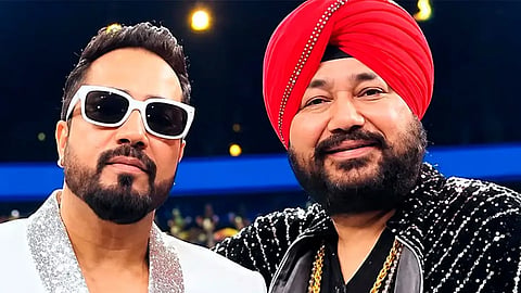 Mika Singh stands with his brother Daler Mehndi