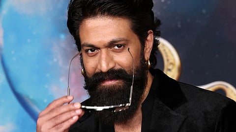 Yash wore a custom gold brooch featuring Ravana’s 10 heads at Ramayana primiere