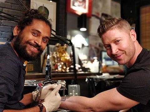 Vikas Malani and former Australian captain Michael Clarke