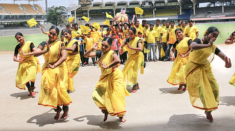 CSK fans dancing at Chepauk stadium