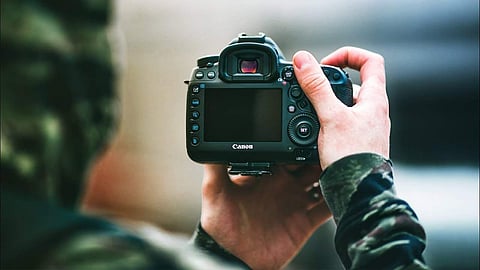 Behind the lens