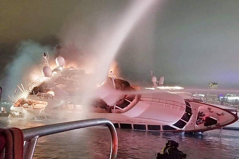 Marc Anthony's yacht at a dock in Miami (Miami-Dade Fire Rescue via AP)