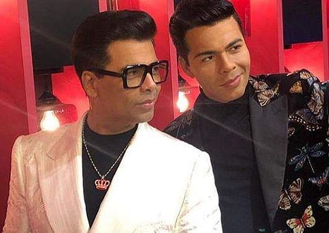 Karan Johar poses with his wax statue at Madame Tussauds