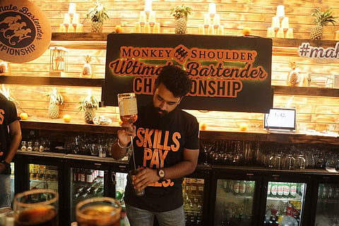 A particpiant at the Ultimate Bartender Championship