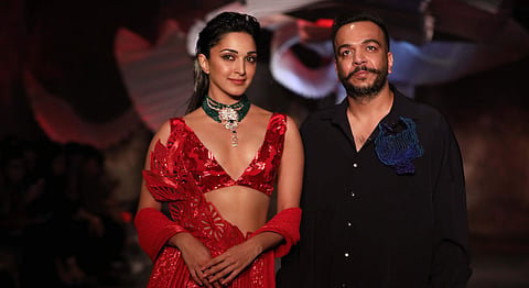 Kiara Advani (wearing an ensemble from the collection) and Amit Aggarwal