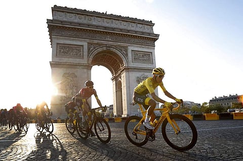 Colombia's Egan Bernal rides past the Arc de Triomphe on the Champs-Elysees during the 21st stage of the Tour de France cycling race in Paris. (AP Photo/Thibault Camus)