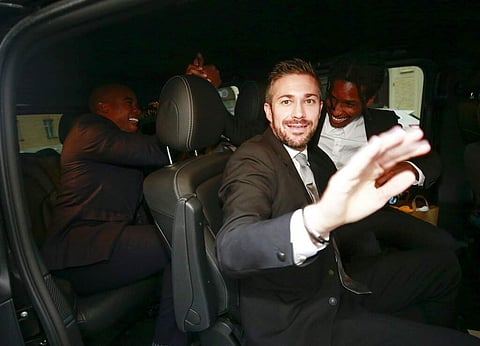 A$AP Rocky on right leaves court (Fredrik Persson/TT News Agency via AP)