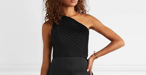 Ruffles, pleats, lace and frills take on modern avatars in the collections of Prada, Alexander Wang and others