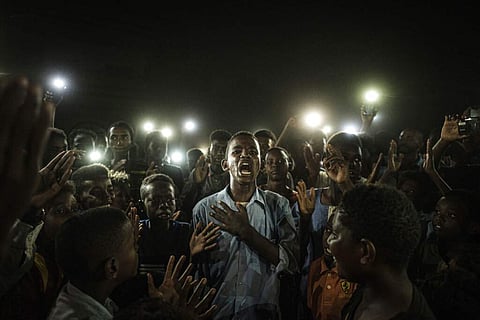 This picture taken by Yasuyoshi Chiba, Agence France-Presse, won the World Press Photo of the Year award, and the first prize in the General News Singles category (Yasuyoshi Chiba, Agence France-Press