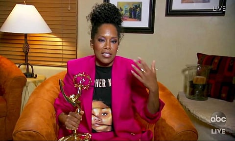 Regina King accepts the award