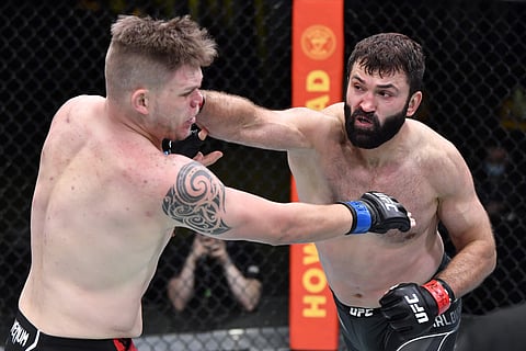 Andrei (right) in an earlier match against Sherman
