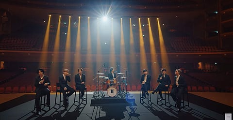 BTS performs at MusiCares Concert. Image Source: Internet