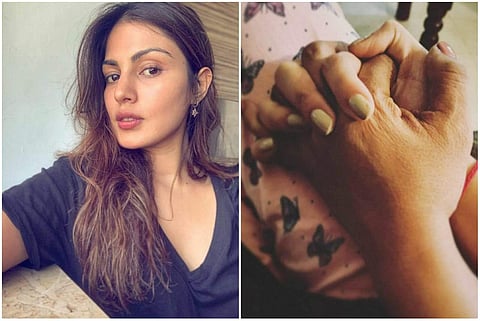 Rhea Chakraborty posted a picture on Instagram where she is seen holding her mother's hand. 
