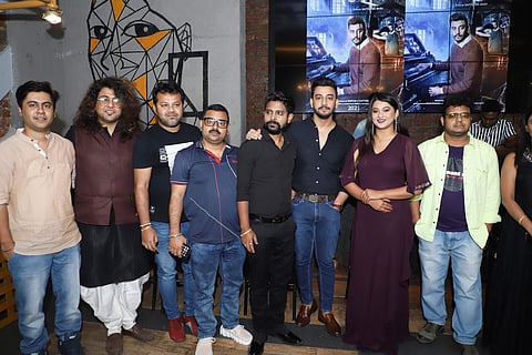 The cast and crew of Jatugriha pose for a memorable frame