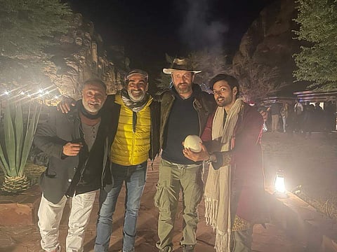 Ali Fazal and Gerard Butler (extreme right))